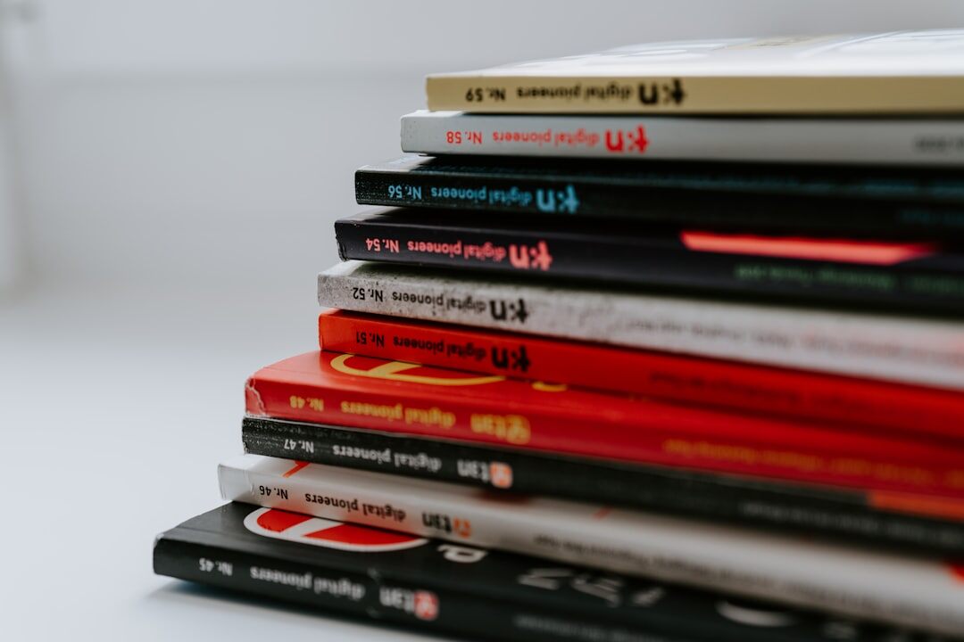 Stack of glossy entertainment magazines on a table