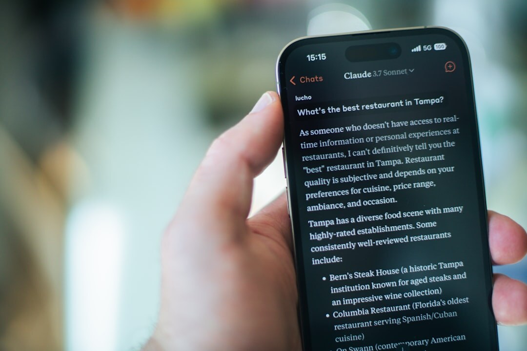 Smartphone displaying a news website in someone's hands